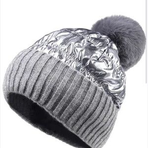 2 metallic puffer beanies with poms